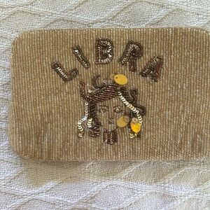 Zodiac clutch by Anthropologie